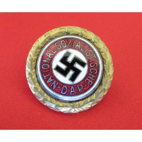 Golden Party Badge #1592 belonging to SS Standartenfuhrer and Deputy Gauleiter  Anton Mundler